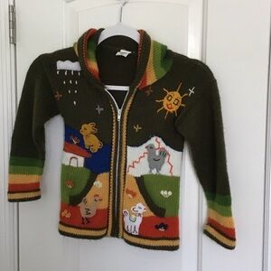 Handcrafted Isabella Mia Peruvian children's zip-up hooded sweater.